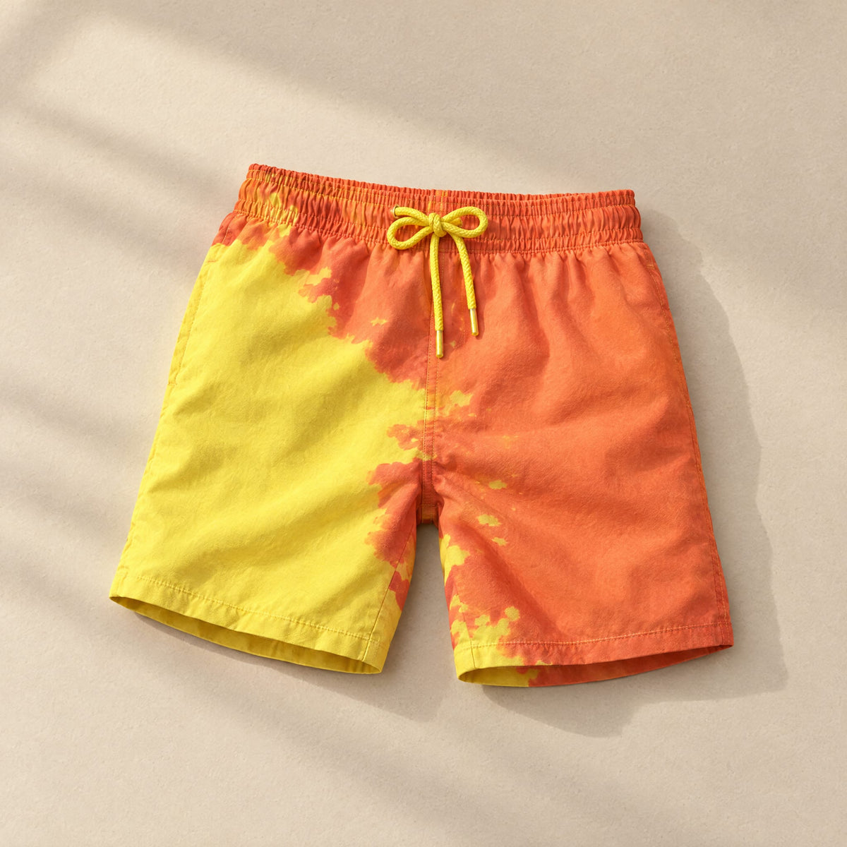 Shift kids' colour-changing swim shorts, Orange to Yellow