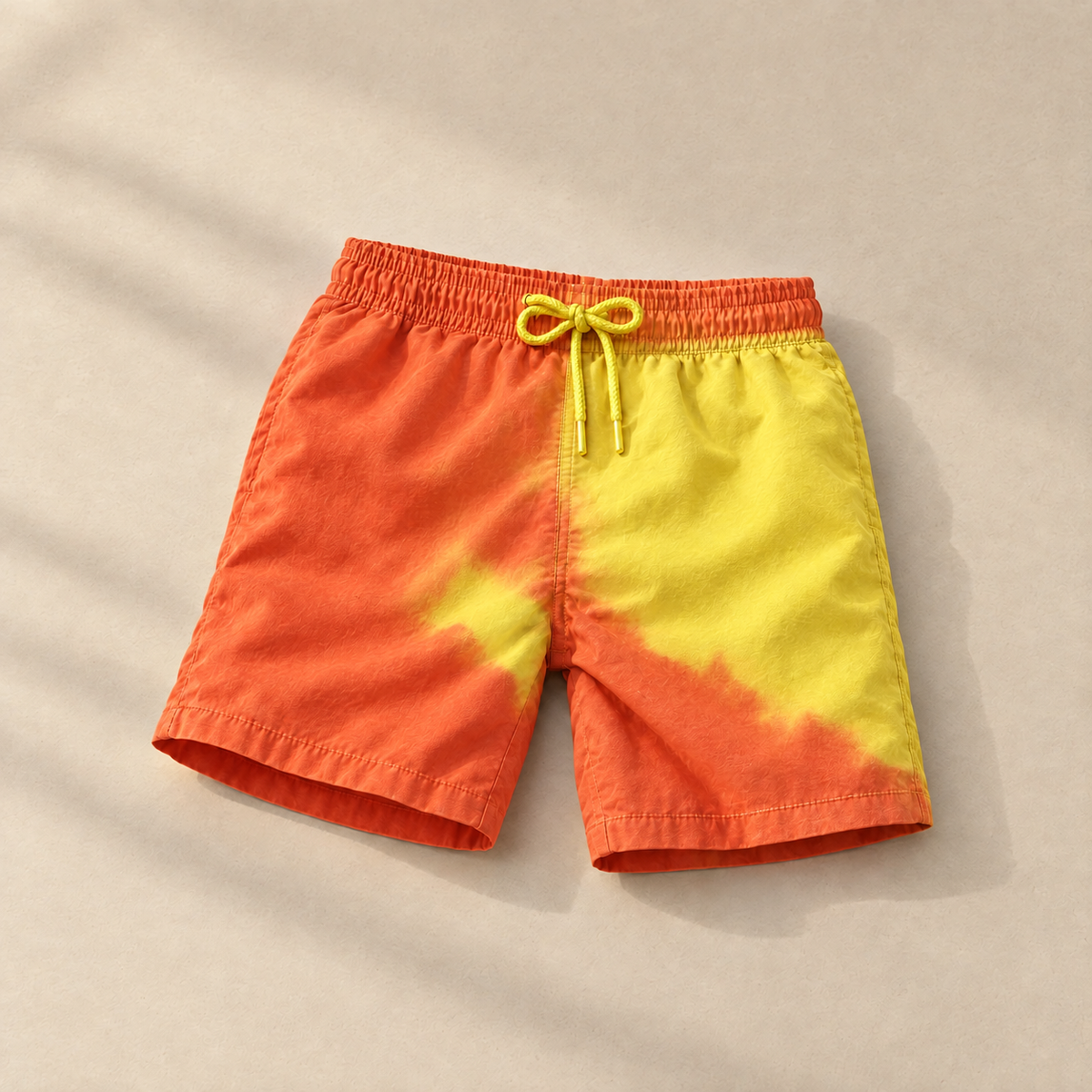 Shift kids colour-changing swim shorts, Orange to Yellow