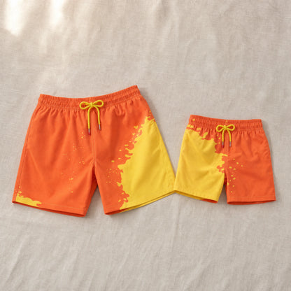 Shift Dad & Mini matching colour-changing swim shorts set, Orange to Yellow