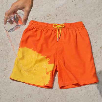Warm water turning Shift Orange to Yellow swim shorts yellow where it lands